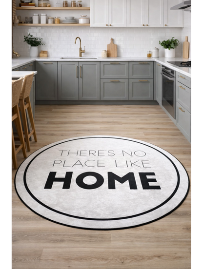 Кръгъл килим с надпис “There’s No Place Like Home” в черно и бяло