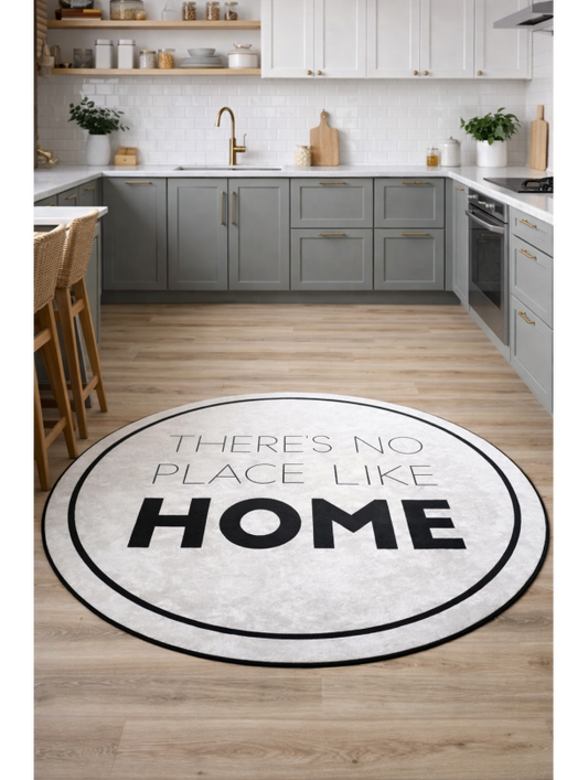 Кръгъл килим с надпис “There’s No Place Like Home” в черно и бяло
